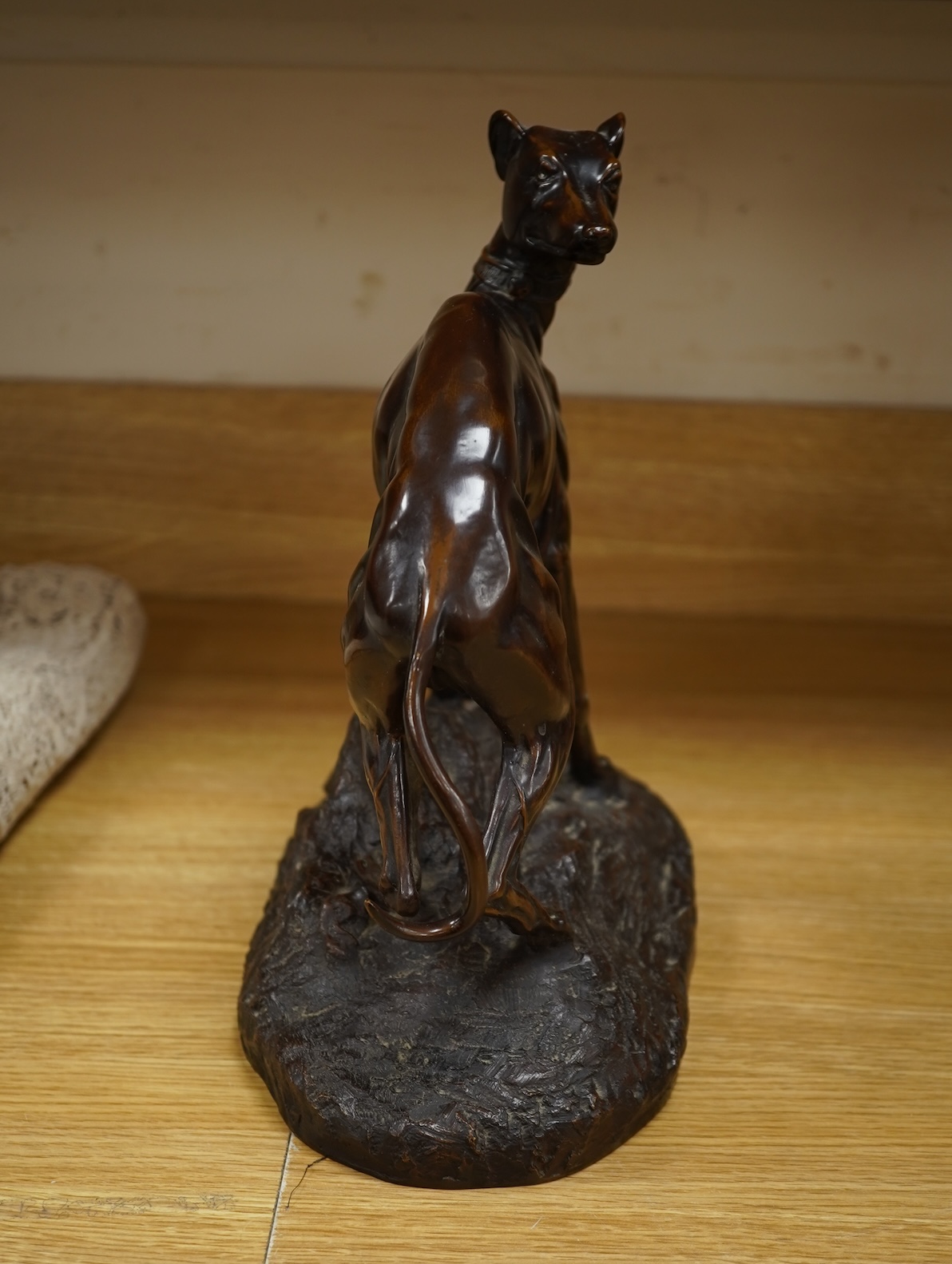After Theodore Gechter, a model of bronze greyhound, 32cm wide x 29.5cm high